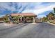 Gated community entrance featuring a horse statue, offering security and a touch of elegance at 4037 Vulcan St, Las Vegas, NV 89122