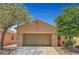 Charming single-story home with a two-car garage, a well-maintained yard, and desert landscaping at 4037 Vulcan St, Las Vegas, NV 89122