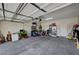 Spacious garage with ample storage space, shelving, and a clean floor at 4037 Vulcan St, Las Vegas, NV 89122