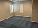 Cozy bedroom with plush carpeting, plantation shutters and lots of light at 4121 Erinbird Ave, North Las Vegas, NV 89084