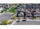 Aerial view of a single-Gathering home showcasing the roof, landscaping, and neighborhood at 4376 Latitude Valley Ct, North Las Vegas, NV 89084