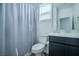 Bathroom with a shower and tub combination, vanity and sink, and modern fixtures for convenience at 4376 Latitude Valley Ct, North Las Vegas, NV 89084