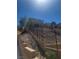 Backyard view showing terraced landscaping, a staircase, and a partial view of the house at 44 Moon Hill Dr, Henderson, NV 89011