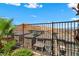 This backyard view showcases the desert landscaping and neighboring houses, nestled in the surrounding landscape at 44 Moon Hill Dr, Henderson, NV 89011