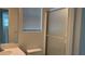 Bathroom with a glass-enclosed shower, and a modern vanity with a sink at 4752 Cactus Sun Ln, North Las Vegas, NV 89031