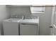 Bright laundry room featuring a new washer and dryer for convenient home living at 4752 Cactus Sun Ln, North Las Vegas, NV 89031