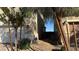 A narrow side yard features desert landscaping and a walkway between houses at 4752 Cactus Sun Ln, North Las Vegas, NV 89031