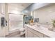 Modern bathroom with a walk-in shower, single sink vanity, and stylish decor at 5004 Fern Mesa Ave # Lot 137, Las Vegas, NV 89139