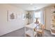 Cozy home office with ample sunlight, modern decor, and a comfortable workspace at 5004 Fern Mesa Ave # Lot 137, Las Vegas, NV 89139