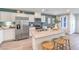 Well-equipped kitchen boasting stainless steel appliances, white cabinetry, and a functional island at 5004 Fern Mesa Ave # Lot 137, Las Vegas, NV 89139