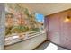 Balcony with a view of the landscape, plants and a glimpse of the surrounding building exterior at 5018 S Rainbow Blvd # 202, Las Vegas, NV 89118
