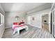 Bright bedroom with fresh paint, wood-look floors, large closet, and ample natural light at 5018 S Rainbow Blvd # 202, Las Vegas, NV 89118