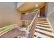 Inviting condo exterior with a stairwell leading to upper-level units at 5018 S Rainbow Blvd # 202, Las Vegas, NV 89118