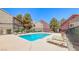 Beautiful community pool area surrounded by meticulously maintained landscaping at 5018 S Rainbow Blvd # 202, Las Vegas, NV 89118