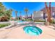 Stunning community pool with a relaxing hot tub and poolside seating at 5018 S Rainbow Blvd # 202, Las Vegas, NV 89118