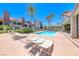 Beautiful community pool area with lounge chairs and meticulously maintained landscaping at 5018 S Rainbow Blvd # 202, Las Vegas, NV 89118