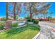Community signage featuring desert landscaping, stacked stone features and lush lawn at 5018 S Rainbow Blvd # 202, Las Vegas, NV 89118