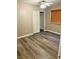Cozy bedroom with modern gray-toned flooring, white trim, a closet, and a window with wood blinds at 5055 Lime Kiln Ave, Las Vegas, NV 89139