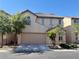 Charming two-story home featuring a two-car garage, well-maintained landscaping, and classic architecture at 5055 Lime Kiln Ave, Las Vegas, NV 89139