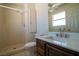 Bathroom with a single sink vanity, a standing shower, and tile flooring at 5170 S Pearl St, Las Vegas, NV 89120