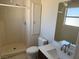Bright bathroom with a step-in shower, new vanity, and tiled floors at 5170 S Pearl St, Las Vegas, NV 89120