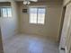 Bedroom featuring a window, closet, and ceiling fan at 5170 S Pearl St, Las Vegas, NV 89120