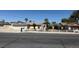 Single-story home featuring mature trees, a well-maintained front yard, and inviting curb appeal at 5170 S Pearl St, Las Vegas, NV 89120