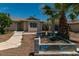 View of the house with desert landscaping at 5170 S Pearl St, Las Vegas, NV 89120