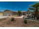 Single-story house with desert landscaping and mature foliage at 5170 S Pearl St, Las Vegas, NV 89120