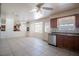 Bright and spacious kitchen with tile floors, ample natural light, and stainless steel appliances at 5170 S Pearl St, Las Vegas, NV 89120