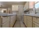 Efficient kitchen layout with ample cabinets, countertops, and essential appliances at 5170 S Pearl St, Las Vegas, NV 89120