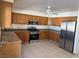 Spacious kitchen features stainless steel appliances and granite countertops at 5170 S Pearl St, Las Vegas, NV 89120