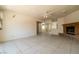 Large living room with tile floors, fireplace, and lots of natural light at 5170 S Pearl St, Las Vegas, NV 89120