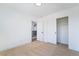 Neutral bedroom with carpet, closet and view of the hall at 529 Fork Mesa Ct, Henderson, NV 89015