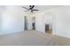 Spacious main bedroom with carpet flooring and en-suite bathroom access at 529 Fork Mesa Ct, Henderson, NV 89015
