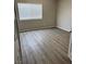 Cozy bedroom featuring sleek flooring and natural light at 5512 Del Lago Dr, Las Vegas, NV 89130