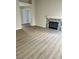 Living room with stylish flooring and a cozy fireplace at 5512 Del Lago Dr, Las Vegas, NV 89130