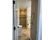 Bathroom featuring a tiled shower and tub with white cabinetry at 5516 Coyote Falls Ct, Las Vegas, NV 89131