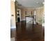 Hallway with hardwood floors and views into a bedroom at 5516 Coyote Falls Ct, Las Vegas, NV 89131