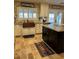 Classic kitchen with a copper sink, granite counters, and stainless steel appliances at 5516 Coyote Falls Ct, Las Vegas, NV 89131