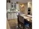 Gourmet kitchen with granite counters, custom cabinets, double oven and tile floor is a chef's dream at 5516 Coyote Falls Ct, Las Vegas, NV 89131