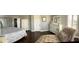 Relaxing main bedroom retreat with designer furnishings and hardwood floors at 5516 Coyote Falls Ct, Las Vegas, NV 89131