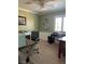An office featuring green walls, neutral carpet and a boat shelf display at 5516 Coyote Falls Ct, Las Vegas, NV 89131