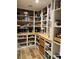 Walk-in pantry with extensive shelving and butcher block countertop at 5516 Coyote Falls Ct, Las Vegas, NV 89131