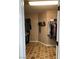 Well-organized walk-in closet with ample hanging space and shelving for storage at 5516 Coyote Falls Ct, Las Vegas, NV 89131