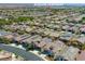 Overhead view of a neighborhood with residential homes; Ardiente Clubhouse marked by red text in the aerial photo at 5650 Pleasant Palms St, North Las Vegas, NV 89081