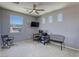 Bonus room with a large window, neutral walls, and modern furnishings at 5650 Pleasant Palms St, North Las Vegas, NV 89081