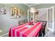 Elegant dining room with open floor plan, stylish chandelier and staircase at 5650 Pleasant Palms St, North Las Vegas, NV 89081