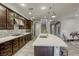 Modern kitchen featuring stainless appliances, an island with bar seating and wood flooring at 5650 Pleasant Palms St, North Las Vegas, NV 89081