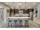 Gorgeous kitchen featuring stainless appliances and a large island with barstool seating at 5650 Pleasant Palms St, North Las Vegas, NV 89081